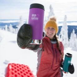 Klean Kanteen Insulated TK Wide With Café Cap 355ml - Brushed Steel 11 Klean Kanteen Insulated TK Wide With Café Cap 355ml - Brushed Steel -Kampa Store K12TKWPCC BB LS snow closeup lifestyle ea727c90 b1ca 45dc 9b96 204fdd194360